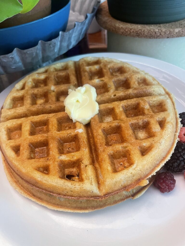 Gluten Free Waffle with butter on top.